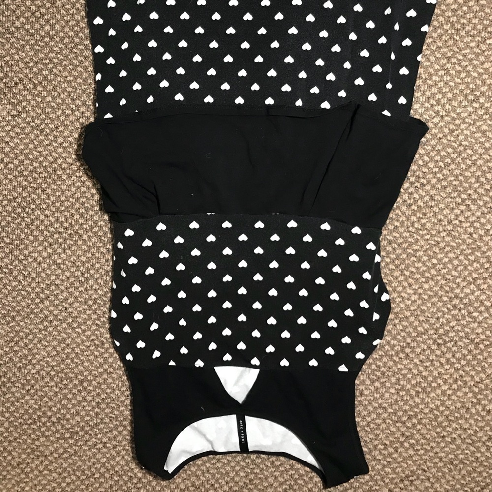 Black peplum dress with white hearts